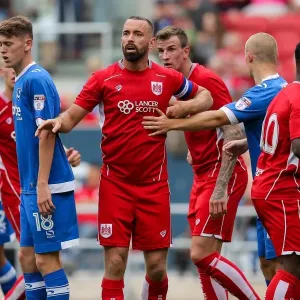 Intense Moment: Wilbraham's Focus Amidst Pre-Season Rivalry (Bristol City vs Portsmouth, 2016)