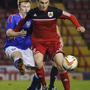 Intense Moment: Young Star Cline's Battle in FA Youth Cup Third Round Proper at Ashton Gate Stadium