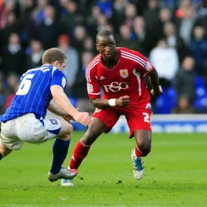 Intense Rivalry: Cisse vs Leadbitter in the Heart of the Football Battle at Portman Road, 2012