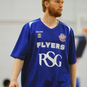Intense Rivalry: Flyers vs. Raiders - Mathias Seilund's Focus during the Basketball Clash Intense Rivalry: Flyers vs. Raiders - Mathias Seilund's Focus during the Basketball Clash