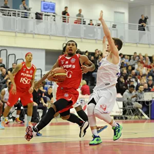 Intense Rivalry: Flyers vs. United at SGS Wise Campus (November 2014) - A Basketball Showdown - Bristol Flyers and Surrey United Go Head-to-Head