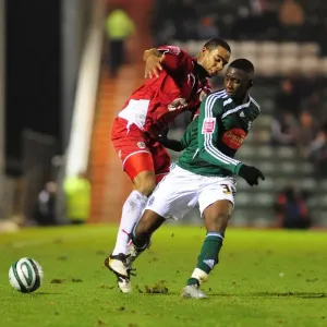 Intense Rivalry: Marvin Elliott vs. Yannick Bolasie - Championship Showdown between Plymouth Argyle and Bristol City (16/03/2010) Intense Rivalry: Marvin Elliott vs. Yannick Bolasie - Championship Showdown between Plymouth Argyle and Bristol City (16/03/2010)
