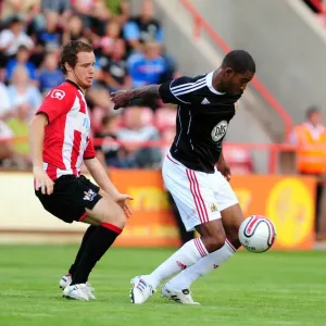 Bristol City FC Print: Marvin Elliott vs. Ryan Harley in Action