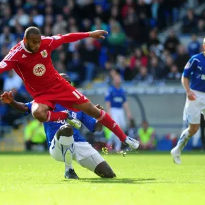 Intense Rivalry: Olofinjana vs. Haynes in the Npower Championship Clash between Cardiff City and Bristol City, October 16, 2010