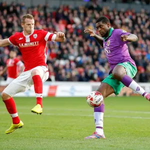 Intense Rivalry: Peter Ramage Stands Firm Against Jay Emmanuel-Thomas's Charge (Barnsley vs. Bristol City, Football) Intense Rivalry: Peter Ramage Stands Firm Against Jay Emmanuel-Thomas's Charge (Barnsley vs. Bristol City, Football)