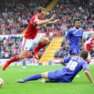 Intense Rivalry: Sam Ricketts vs. David Davis - A Football Showdown at Ashton Gate