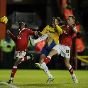 Intense Rivalry: Wilbraham and Agard Fight for Control in Bristol City vs Crawley Town Football Match, December 2014