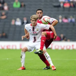Intense Rivalry: Williams vs. Bamford - Battle for Possession in Bristol City vs. Milton Keynes Dons