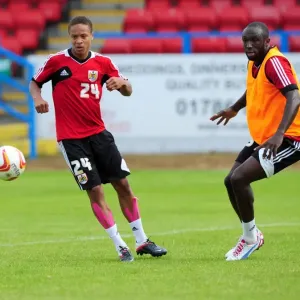 Intense Training Showdown: Bobby Reid vs. Damion Stewart - A Battle for the Ball
