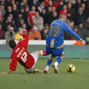 Ivan Sproule challenges portsmouth left back Nadir Belhadj