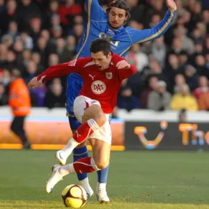 Ivan Sproule is chased by Niko Kranjcar
