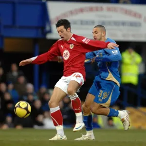 Ivan Sproule escapes the attentions of Nadir Belhadj as he runs through on goal