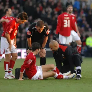 Ivan Sproule recieves treatment for an injury