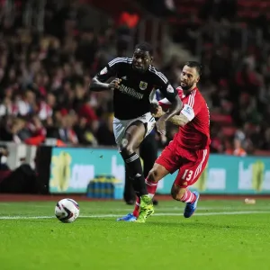 Jay Emmanuel-Thomas of Bristol City Skirts Past Danny Fox of Southampton in Capital One Cup Clash