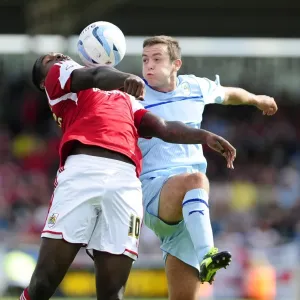 Jay Emmanuel-Thomas Faces Pressure from Blair Adams in Coventry vs. Bristol City Football Match, Sky Bet League One Jay Emmanuel-Thomas Faces Pressure from Blair Adams in Coventry vs. Bristol City Football Match, Sky Bet League One