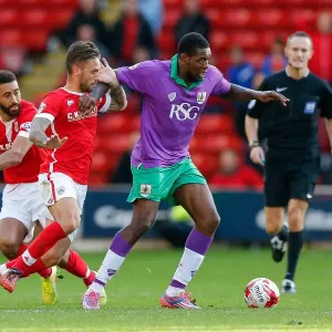 Jay Emmanuel-Thomas vs Barnsley Defense: Intense Moment at Oakwell Stadium, 2014 Jay Emmanuel-Thomas vs Barnsley Defense: Intense Moment at Oakwell Stadium, 2014