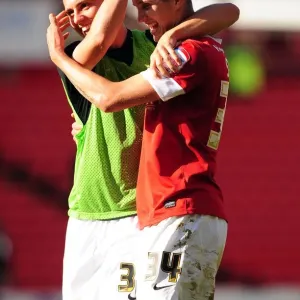 Print of John Stones and Danny Rose celebrating a 1-0 Barnsley victory