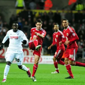 Johnson Clears the Way: Bristol City vs Swansea City, Championship Football Match, 10/11/2010