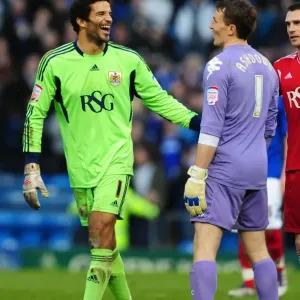 Joke's On Them: David James and Jamie Ashdown Share a Laugh During Portsmouth vs. Bristol City Match, 2012