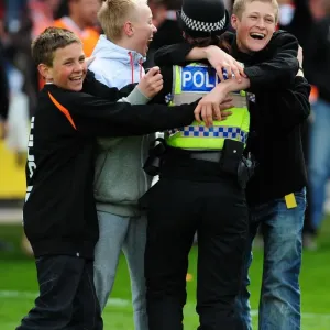 Jubilant Blackpool Fans Celebrate Championship Victory with Police: Blackpool v Bristol City (02/05/2010)