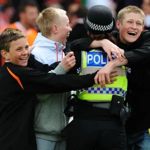 Jubilant Blackpool Fans Celebrate with Police after Championship Victory over Bristol City (02/05/2010)