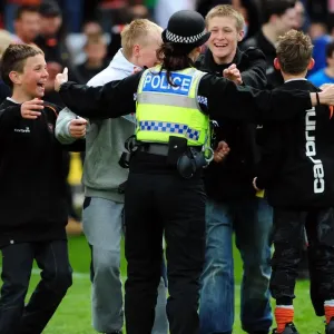 Jubilant Blackpool Fans Celebrate Promotion with Police after Winning Championship Game vs. Bristol City (02/05/2010)