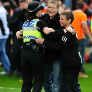 Jubilant Blackpool Fans and Police: Unforgettable Championship Victory Celebration - Blackpool v Bristol City (2010)