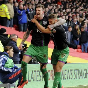 Print of two Bristol City players celebrating a victory
