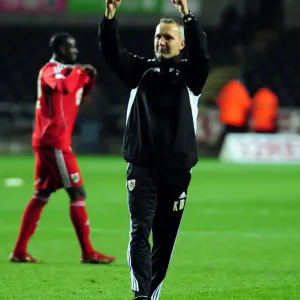 Keith Milen's Championship Victory: Bristol City Manager Celebrates at Swansea City's Liberty Stadium (10/11/2010)