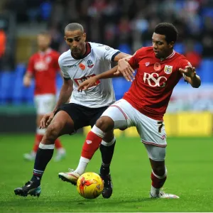 Korey Smith vs Darren Pratley: Intense Battle for Possession in Bolton Wanderers vs Bristol City Championship Clash Korey Smith vs Darren Pratley: Intense Battle for Possession in Bolton Wanderers vs Bristol City Championship Clash