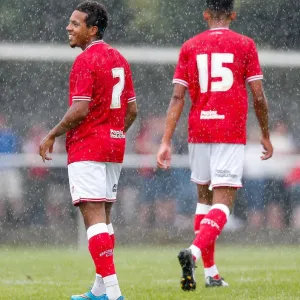 Print of Korey Smith Smiling After Scoring a Goal in Preseason Match
