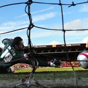 Lee Johnson's Euphoric Moment: Celebrating the Second Goal Against Scott Carson and West Bromwich Albion in Bristol City's Championship Victory (February 21, 2010)