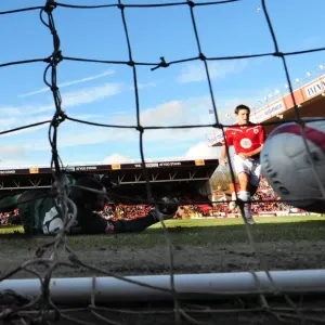 Lee Johnson's Euphoric Moment: Beating Scott Carson for Bristol City's Second Goal vs. West Bromwich Albion - Championship Football, 21st February 2010