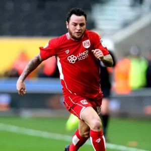 Lee Tomlin in Action: Wolverhampton Wanderers vs. Bristol City, Sky Bet Championship, Molineux Stadium Lee Tomlin in Action: Wolverhampton Wanderers vs. Bristol City, Sky Bet Championship, Molineux Stadium