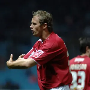 Lee Trundle appeals to the linesman after he appeared