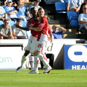 Liam Fontaine and Brian Wilson smother Nicky Maynard after his equalizer