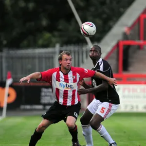 Marcus Stewart battles for the ball with Bristol Citys Kalifa Cisse