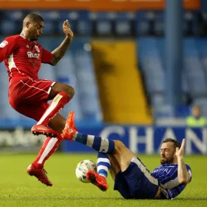 Mark Little Tackles Steven Fletcher: Intense Moment from Sheffield Wednesday vs. Bristol City Championship Clash