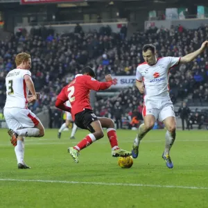 Print of a football challenge between MK Dons and Bristol City Print of a football challenge between MK Dons and Bristol City