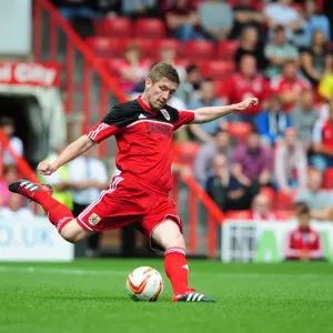 Print of Mark Wilson in Action at Louis Carey's Testimonial
