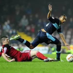 Print of Mark Wilson tackling Junior Stanislas at Ashton Gate Stadium Print of Mark Wilson tackling Junior Stanislas at Ashton Gate Stadium