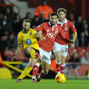 Marlon Pack of Bristol City Closes In on Sammy Moore of AFC Wimbledon during Johnstone's Paint Trophy Match