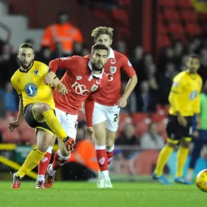 Marlon Pack of Bristol City Closes Down Sammy Moore of AFC Wimbledon during Johnstone's Paint Trophy Match