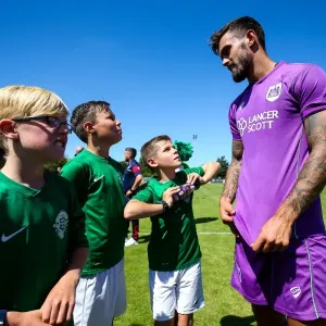 Marlon Pack of Bristol City Meets Young Mascots during Guernsey FC vs. Bristol City Pre-season Friendly Marlon Pack of Bristol City Meets Young Mascots during Guernsey FC vs. Bristol City Pre-season Friendly