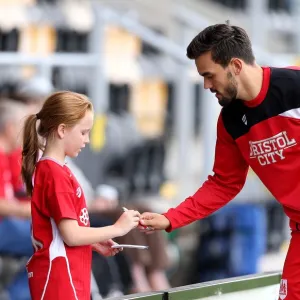 Marlon Pack of Bristol City Signs Autograph for Fan at Burton Albion Match