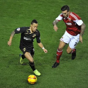 Marlon Pack Chases Kyle Bennett: Intense Football Action at Cardiff City Stadium Marlon Pack Chases Kyle Bennett: Intense Football Action at Cardiff City Stadium