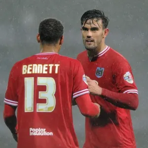 Maron Pack and Elliott Bennett of Bristol City: A Moment at Huddersfield's St. John Smith's Stadium Maron Pack and Elliott Bennett of Bristol City: A Moment at Huddersfield's St. John Smith's Stadium