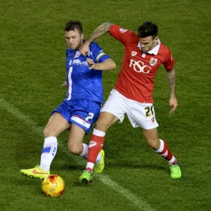 Maron Pack vs Doug Loft: Intense Battle for the Ball during Bristol City vs Gillingham, Johnstone's Paint Trophy Southern Area Final