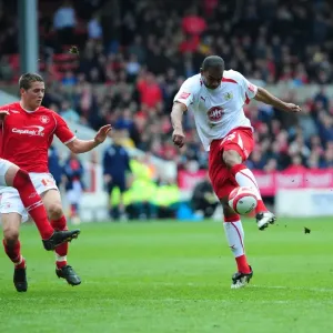 Marvin Elliott sees his shot blocked