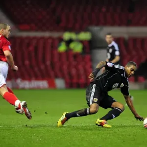 Marvin Elliott Tackles Joel Lynch in Intense Forest vs. Bristol City Championship Clash